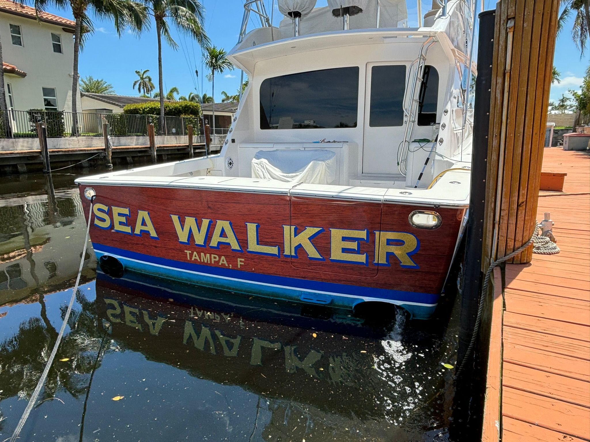 Boat with custom lettering on its side